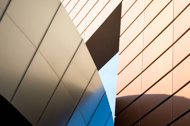 istock walls of a high orange modern building 1218233107