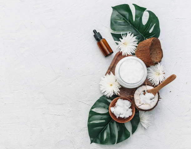 Composition with coconut products, body care concept, coconut oil on white background stock photo