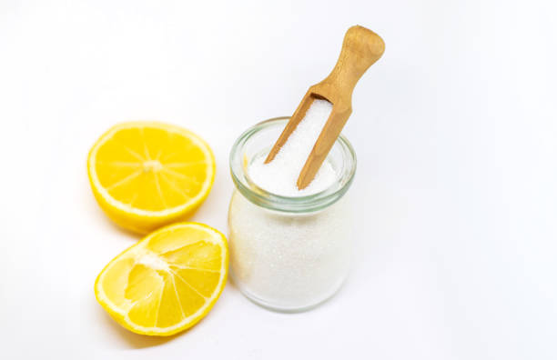 istock Citric acid on a white isolated background. Selective focus. 1218233700