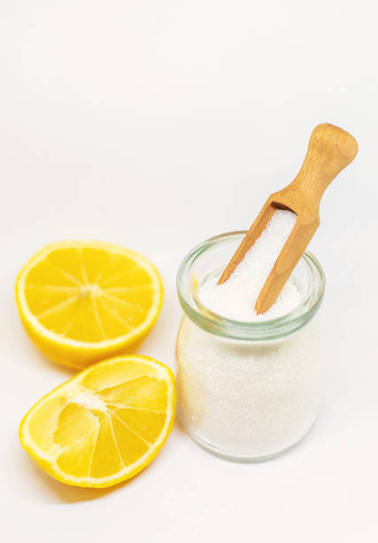 istock Citric acid on a white isolated background. Selective focus. 1218233702
