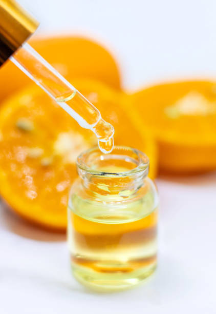 istock Orange essential oil on a white isolated background. Selective focus. 1218234290
