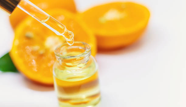 istock Orange essential oil on a white isolated background. Selective focus. 1218234295