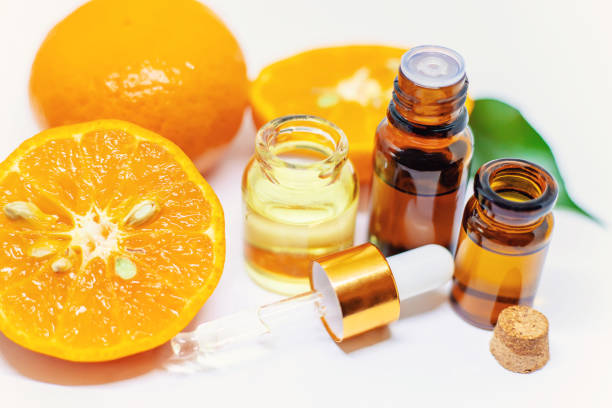istock Orange essential oil on a white isolated background. Selective focus. 1218234296