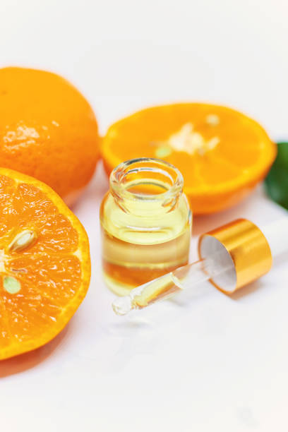 istock Orange essential oil on a white isolated background. Selective focus. 1218234300