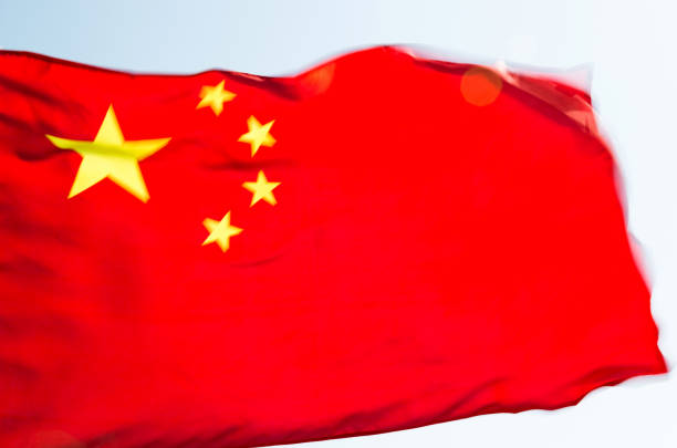 istock Closeup of waving China flag 1218234547