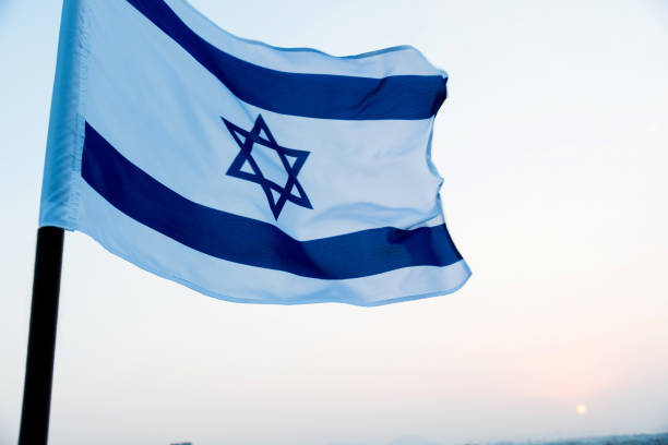 istock Israel's national flag in the wind 1218234680
