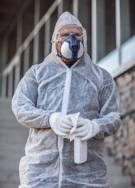istock A male essential worker wearing a face mask during virus outbreak 1218237358