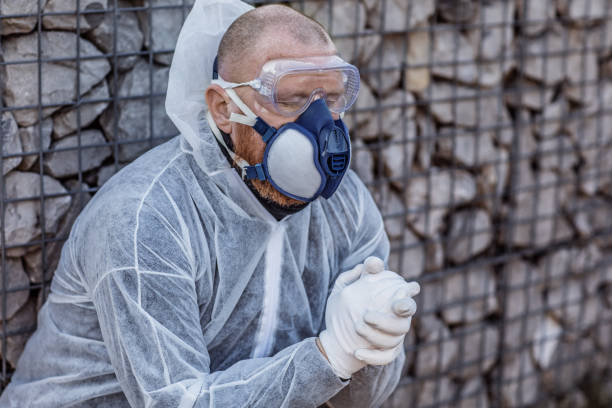 istock A male essential worker wearing a face mask during virus outbreak 1218237742