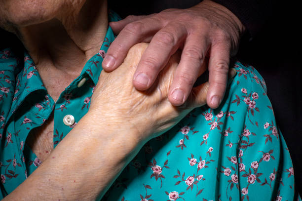 istock support to an elderly woman 1218238216
