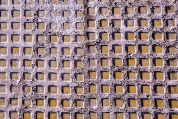 istock old damaged tiled wall, good as a texture or background design element 1218239278