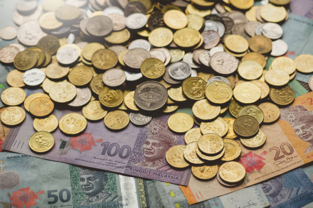 Malaysia Currency Notes and Coins - Money and Finance Concept Image of Malaysia Currency Notes and Coins - Money and Finance Concept coins of ringgit of malaysia stock pictures, royalty-free photos & images