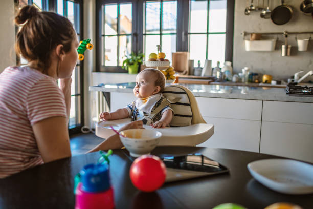 istock Playfull mum with little baby boy 1218241059