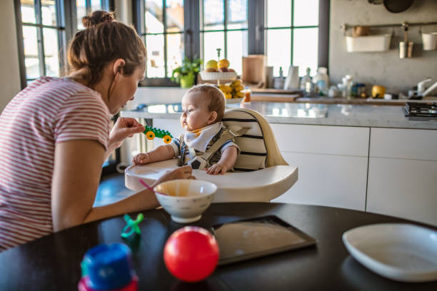 istock Playfull mum with little baby boy 1218241568