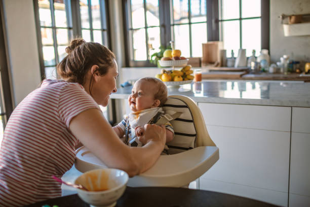 istock Playfull mum with little baby boy 1218242211