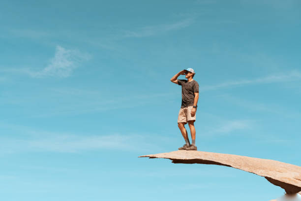 Man Standing On Potato Chip Rock San Diego