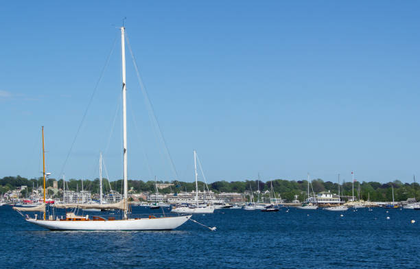 istock Newport harbor with two-masted sailing ship in foreground 1218243616