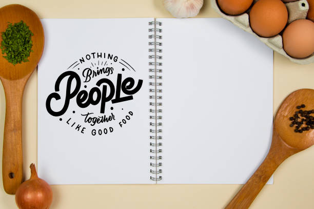 istock Wooden ladles with spices, eggs and garlic with a blank notebook page 1218245669
