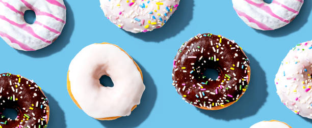 istock Collection of delicious donuts overhead view 1218246441
