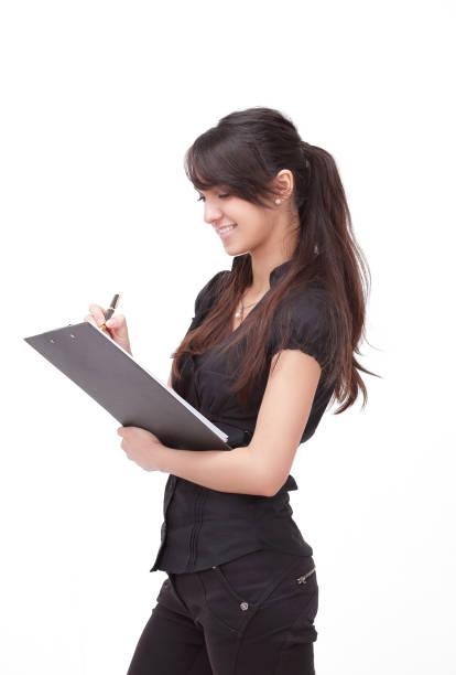 istock modern business women with documents.isolated on white. 1218250455