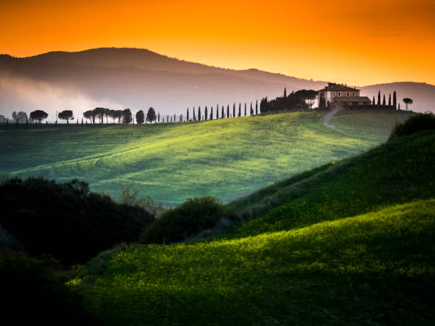 istock sunset in the Tuscany Hills 1218253329