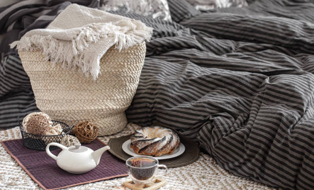 istock A teapot and a Cup of tea on the table in a cozy home interior. 1218257362