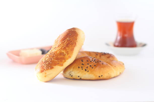 turkish pastry pogaca and tea on white background. traditional bakery - baking traditional culture studio shot horizontal imagens e fotografias de stock