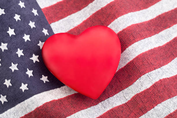 istock American flag with red heart 1218258095