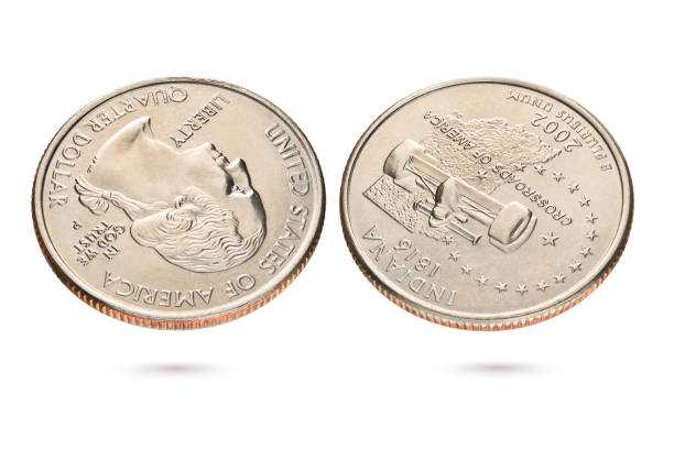 istock Twenty five US cents or quarter coin isolated on white. 1218258113