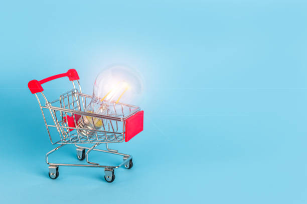 istock light bulb in a shopping trolley on a blue background 1218258142