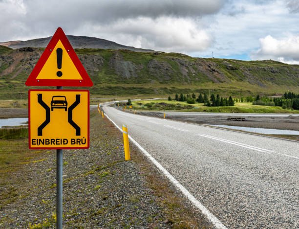 The famous Einbreid Bru sign in Iceland next to a bridge