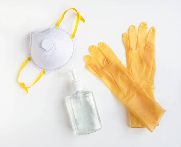 istock Yellow Personal Protective Equipment with NIOSH 95 Mask 1218260416