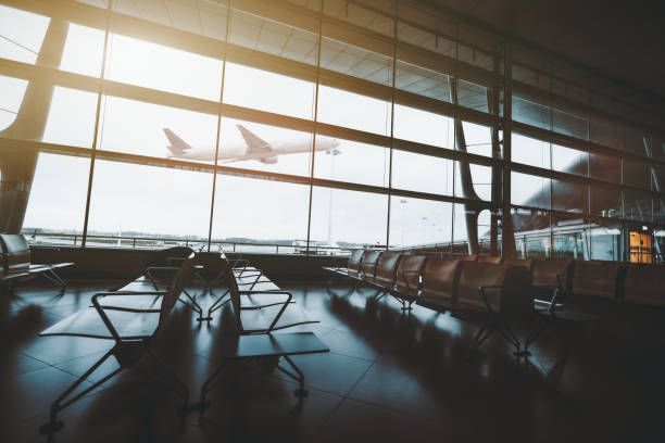 istock Airport interior and the airplane 1218260533