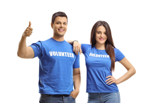 Volunteers posing and showing thumbs up Volunteers posing and showing thumbs up isolated on white background contributor stock pictures, royalty-free photos & images