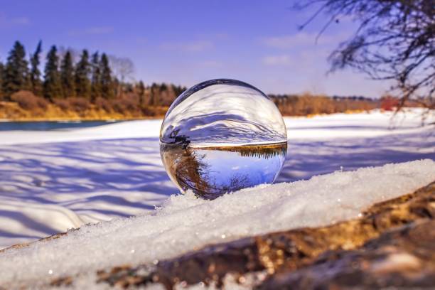 istock Snowy Park Through A Lensball 1218272464