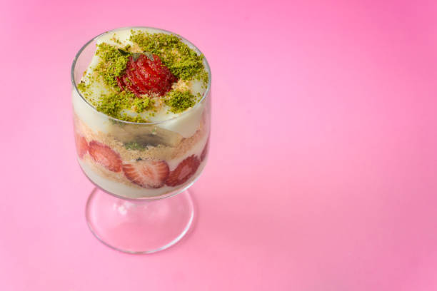 magnolia dessert in glass and pink background
