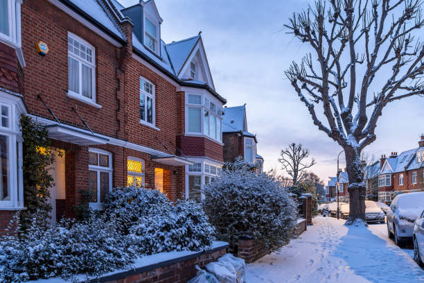 Winter sunrise in snowy suburb in London, UK Winter sunrise in snowy suburb in London, UK winter wonderland london stock pictures, royalty-free photos & images