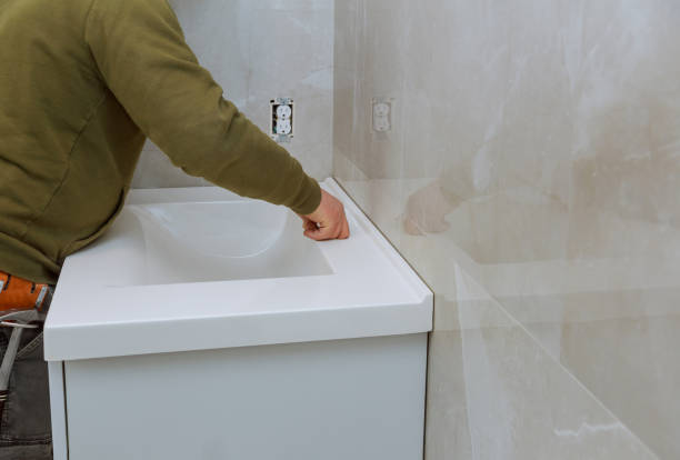 istock Remodeling renovation in bathroom with installing counter tap 1218273668