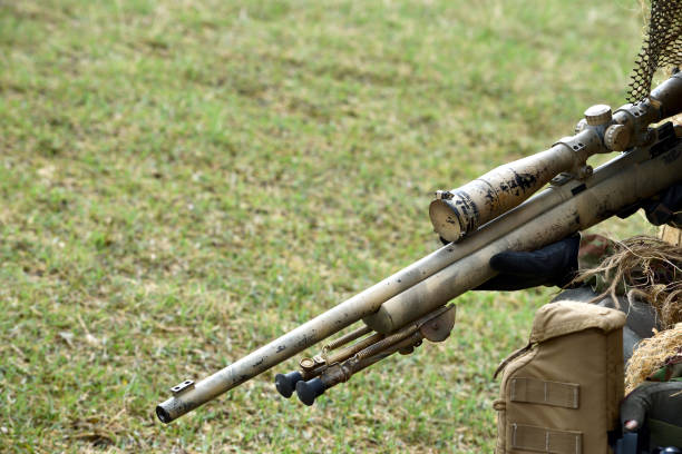 istock Camouflaged military sniper 1218275530