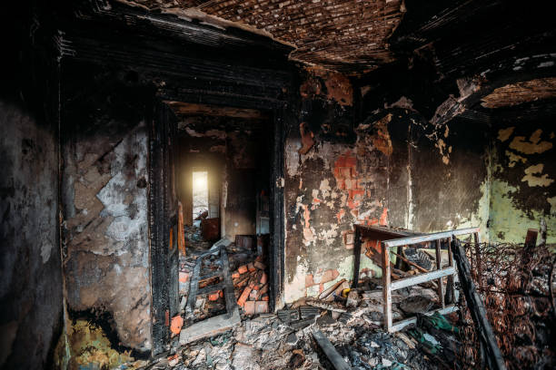 istock Burnt old rural house interior. Consequences of fire 1218279773