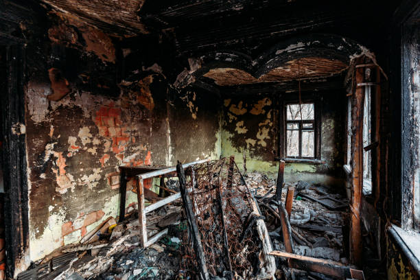 istock Burnt old rural house interior. Consequences of fire 1218279774