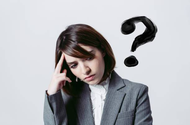 istock Thinking young businesswoman. Facial expression. 1218281875