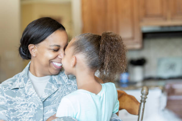 istock Veteran Mother and daughter being affectionate 1218283606