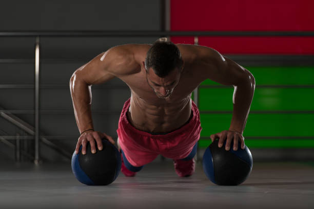 istock Push Ups With Medicine Ball 1218285119