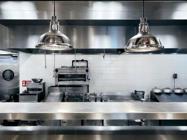 Commercial kitchen Commercial kitchen with clean counter top indoors restaurant hotel work tool stock pictures, royalty-free photos & images