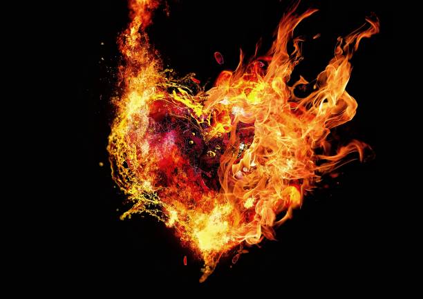 Abstract fire heart illuminating the dark Abstract fire heart illuminating the dark passion stock pictures, royalty-free photos & images