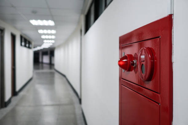 istock Alarm bells and warning lights for avoiding fire. Close up on fire hydrant, the background is in the corridor. 1218300479