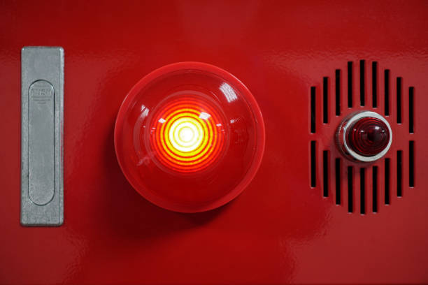 istock Alarm bells and warning lights for avoiding fire. Close up on fire hydrant, the background is in the corridor. 1218300490