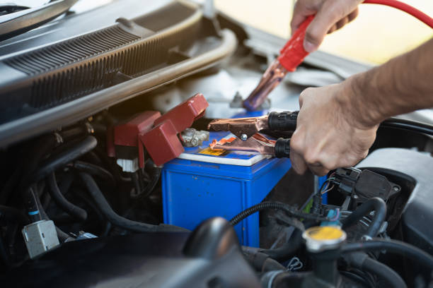 istock the man checking car battery, repair car 1218305329