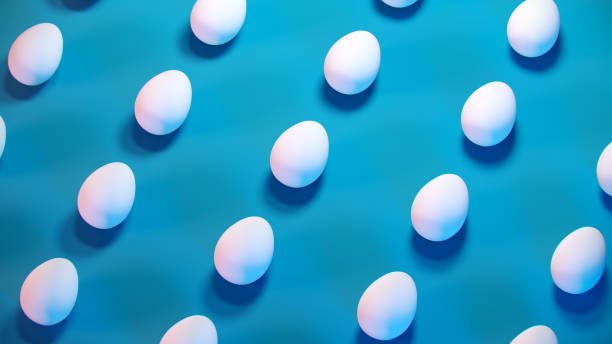 istock 3d trendy Easter blue pastel background pattern. Minimal fashion banner with white eggs, creative concept. 3d render. 3d illustration. 1218306049