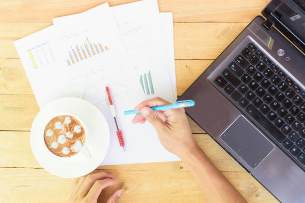 istock Work from home with hot coffee on the table / hot coffee with laptop on work space 1218306813